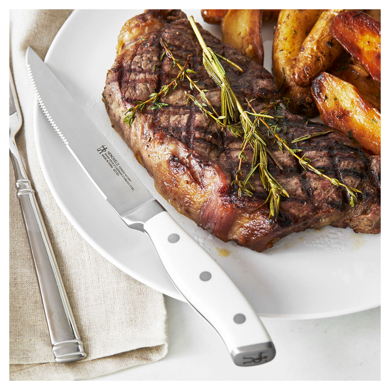 Ensemble 4 couteaux à steak - Henckels Forged Accent - Henckels - Couteau à steak - - La Guilde Culinaire